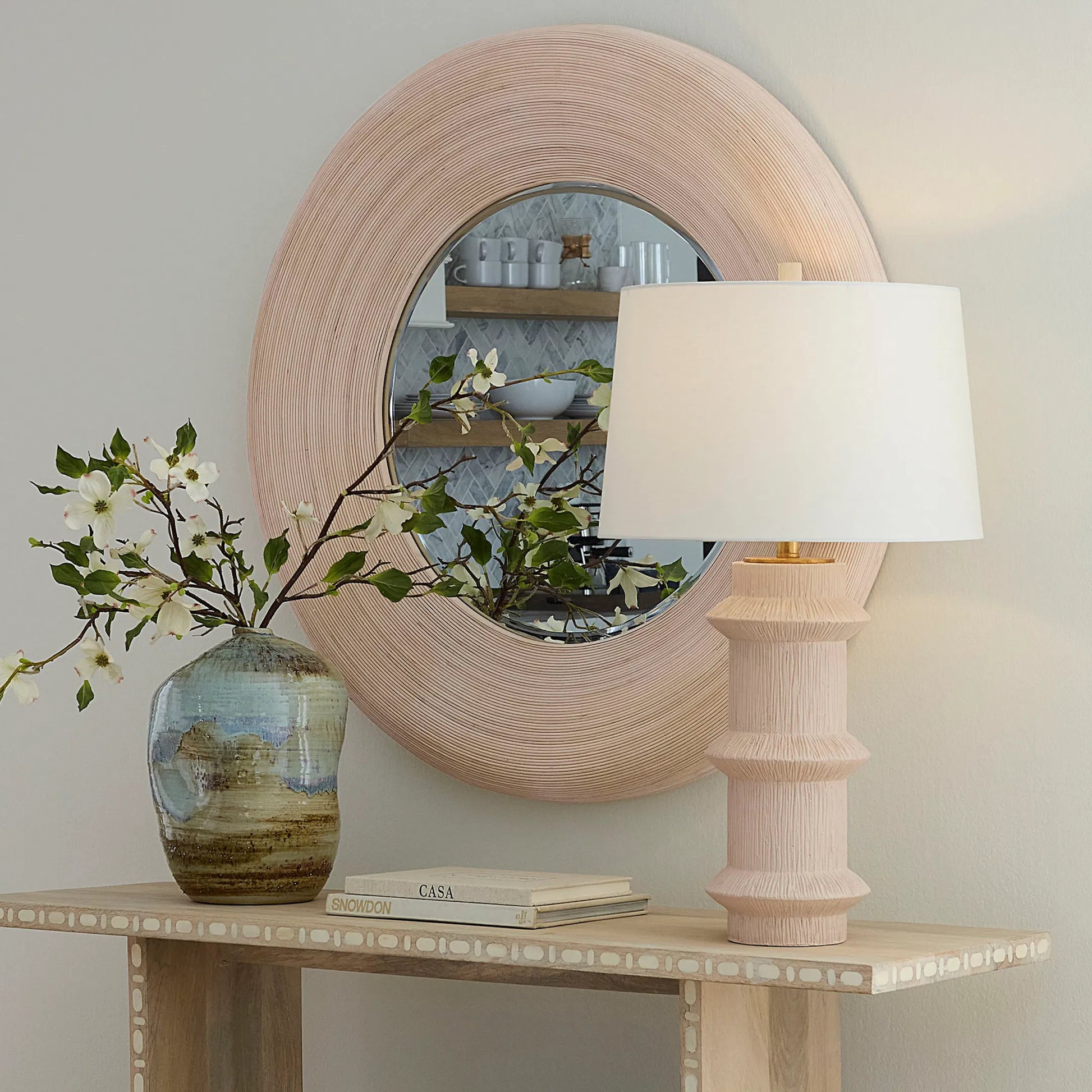 Trousdale Table Lamp by Jamie Young in cream and textured cream. Made from polyresin in a modern style.