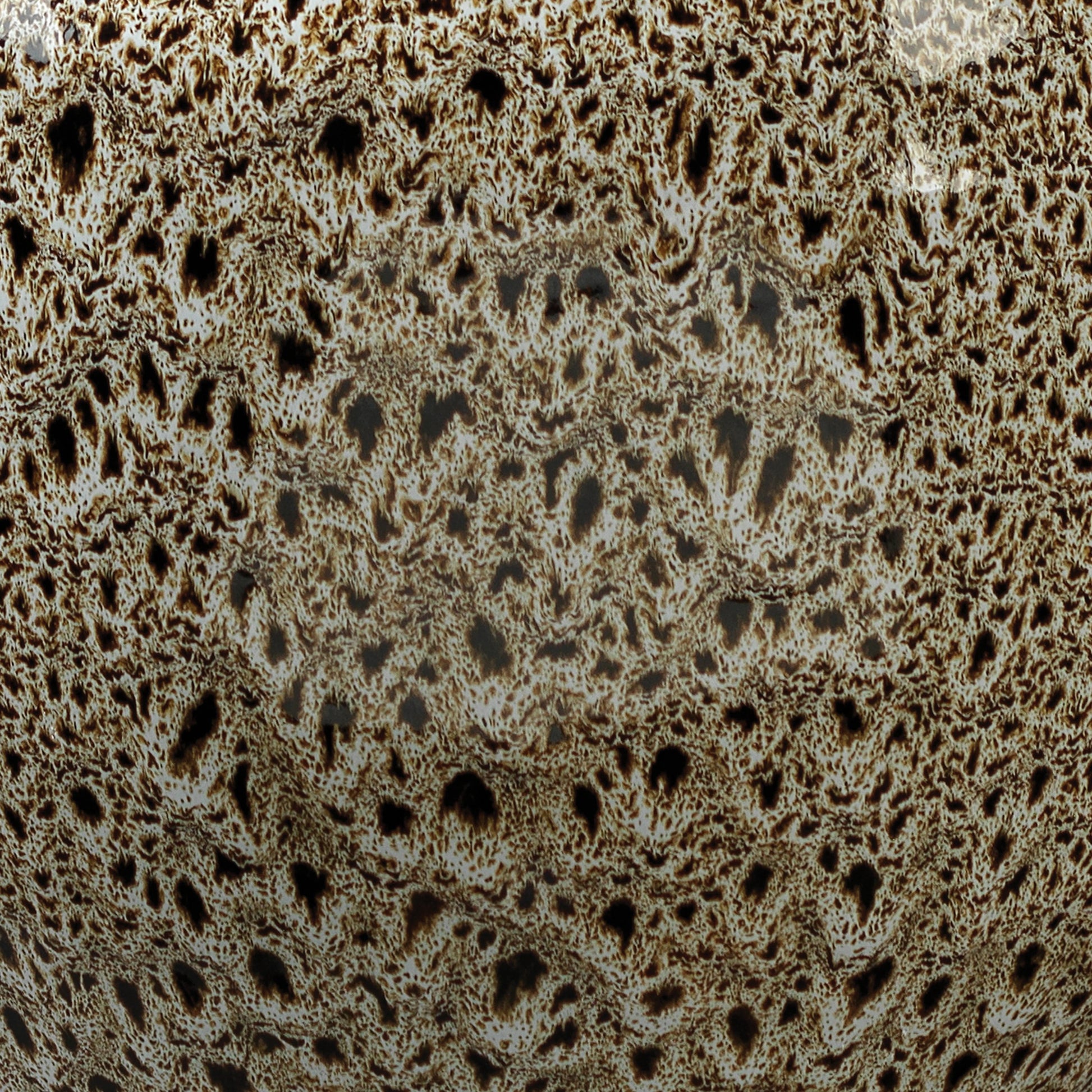 Vagabond Table Lamp by Jamie Young in brown. Made from ceramic in a transitional style.