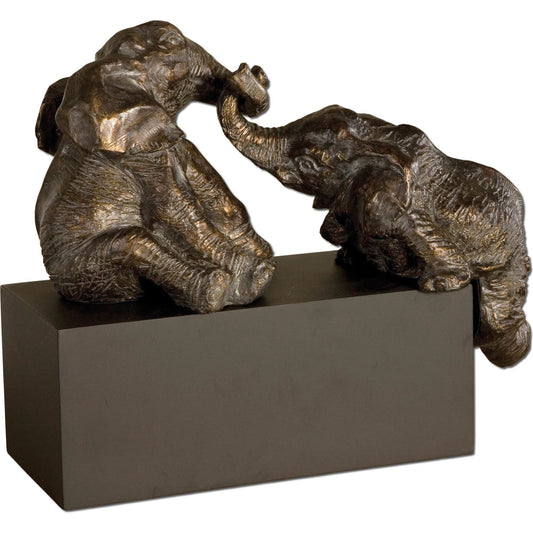 Playful Pachyderms Bronze Figurines by Uttermost in bronze. Made from resin in a eclectic & global style.