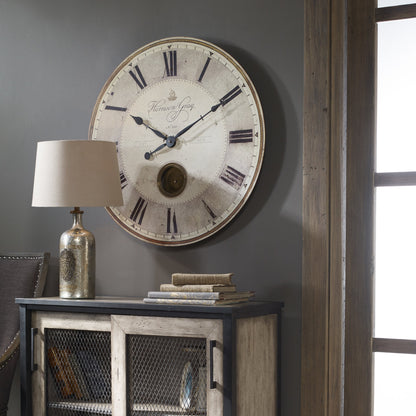 Harrison Clock by Uttermost in gray. Made from mdf, brass, aluminum in a traditional style.