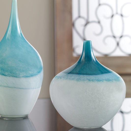 Carla Vases (Set of 2) by Uttermost in white. Made from glass in a modern style.