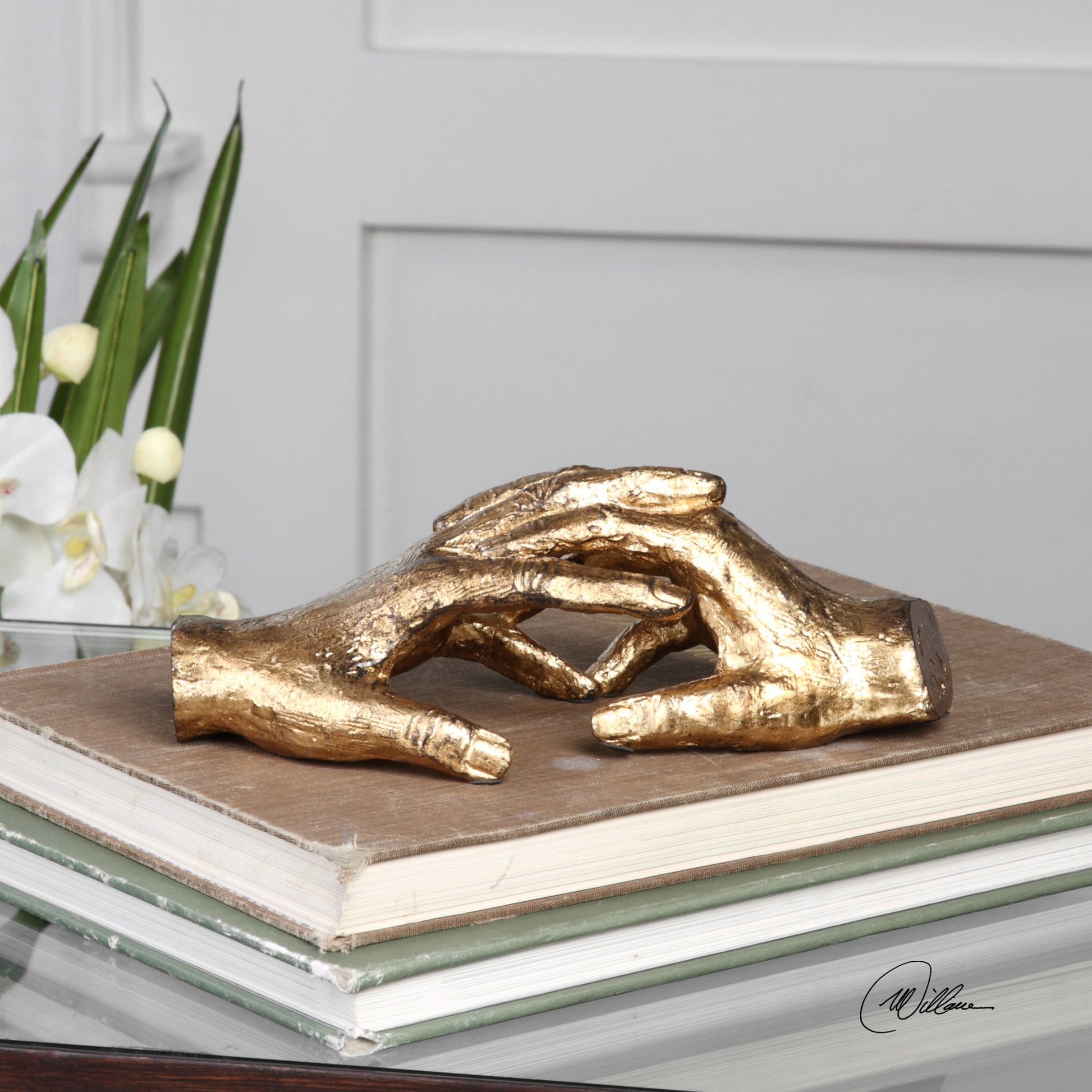 Hold My Hand Sculpture by Uttermost in gold. Made from iron in a modern style.