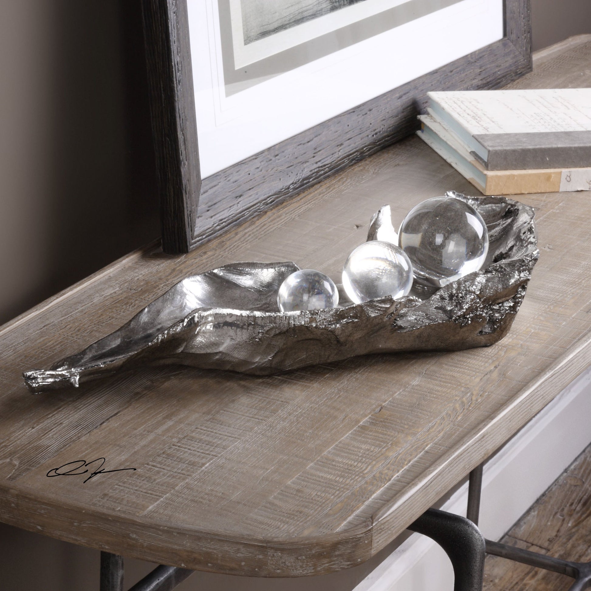 Three Peas in a Pod Metallic Sculpture by Uttermost. Made from resin, crystal in a modern style.