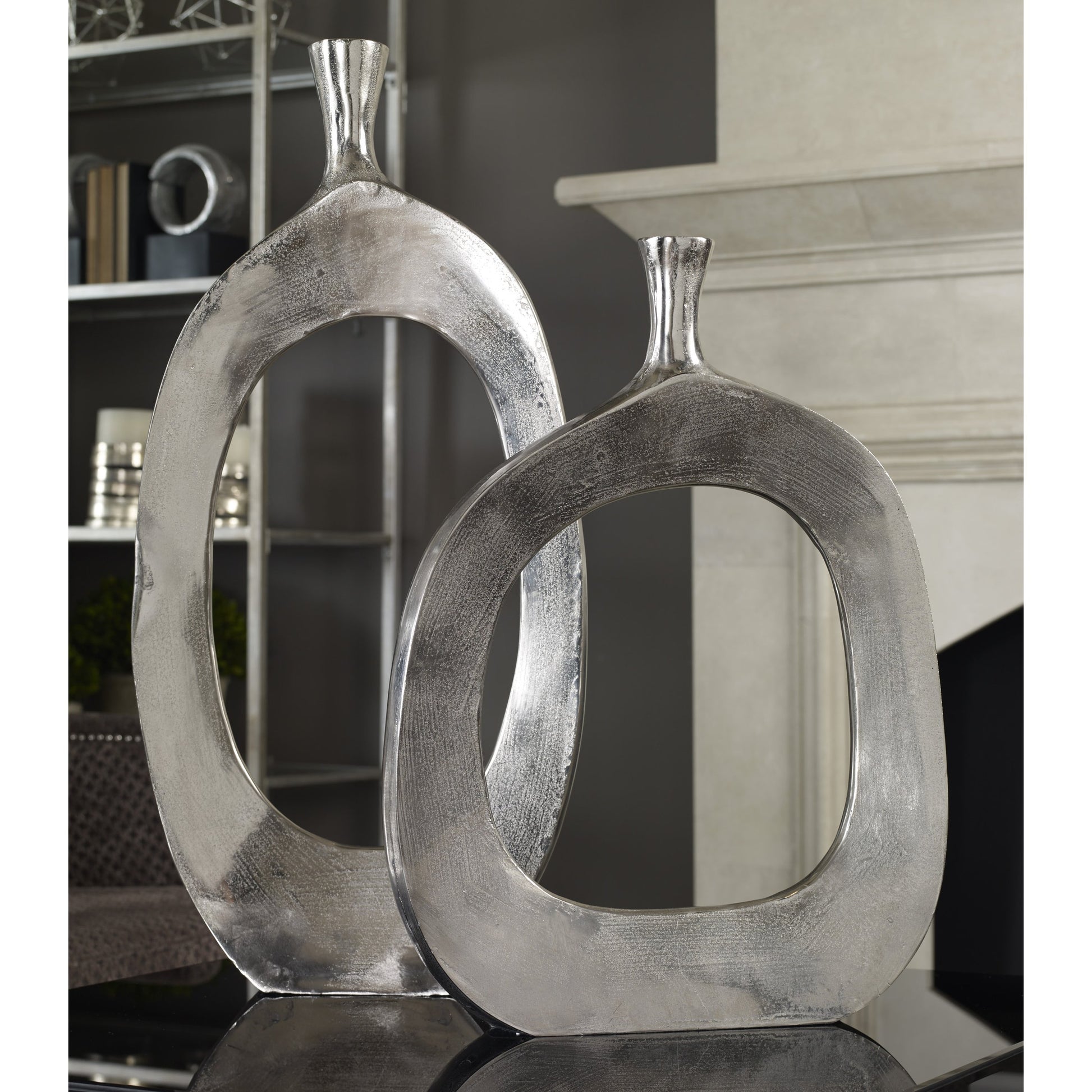 Cierra Aluminum Vases (Set of 2) by Uttermost. Made from cast aluminum in a modern style.