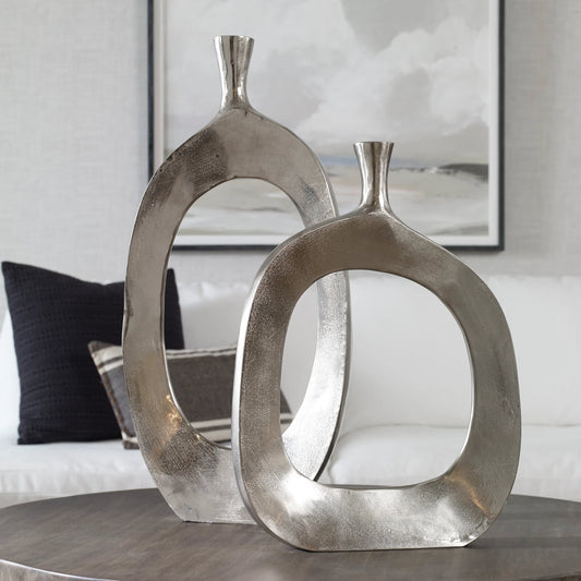 Cierra Aluminum Vases (Set of 2) by Uttermost. Made from cast aluminum in a modern style.