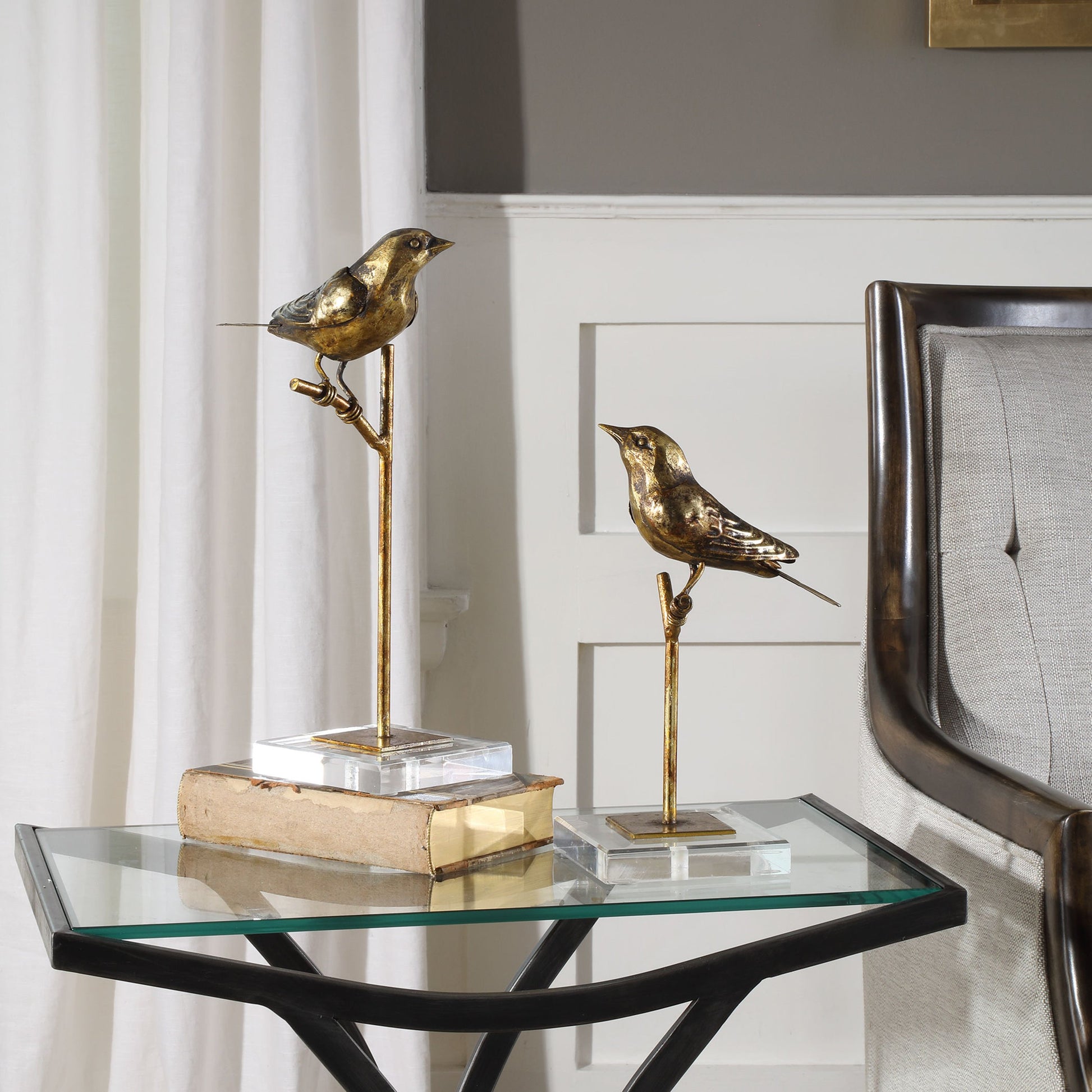 Passerines Bird Sculptures (Set of 2) by Uttermost. Made from polyresin, iron, crystal in a cottage & farmhouse style.