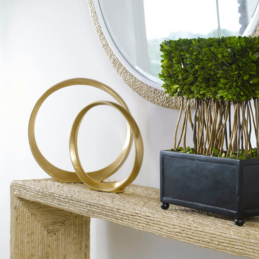 Jimena Ring Sculptures by Uttermost in gold. Made from aluminum in a eclectic & global style.