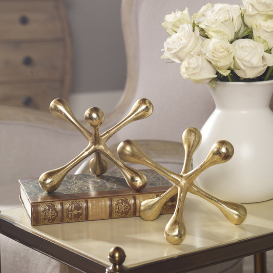 Harlan Brass Objects by Uttermost. Made from aluminum in a modern style.