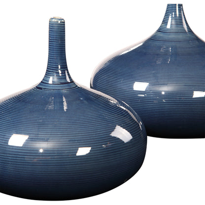 Zayan Blue Vases by Uttermost in blue. Made from ceramic in a transitional style.