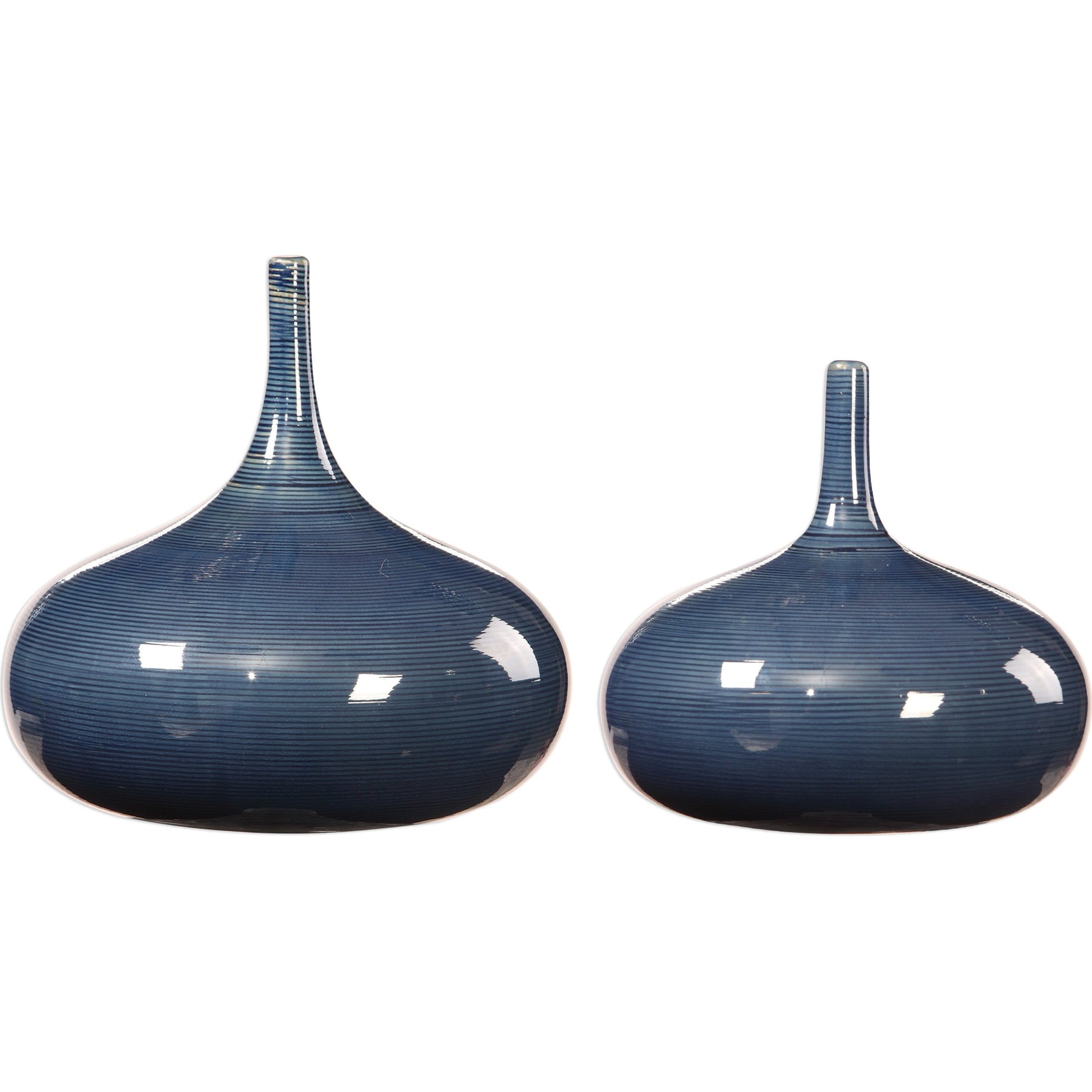 Zayan Blue Vases by Uttermost in blue. Made from ceramic in a transitional style.