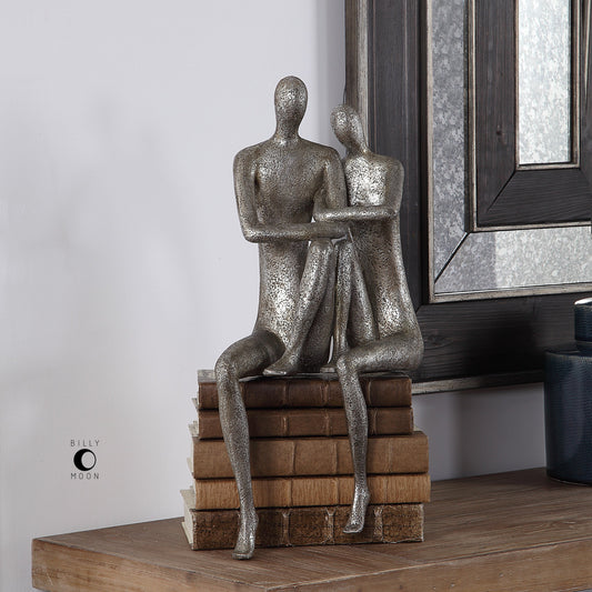 Courtship Figurine by Uttermost in nickel. Made from resin in a modern style.