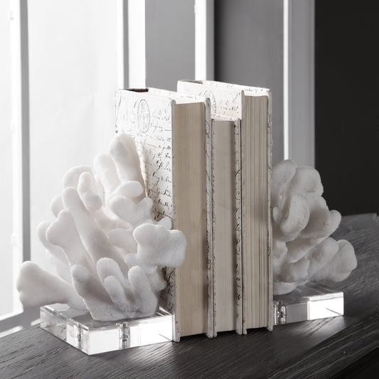 Charbel Bookends by Uttermost in white. Made from resin, k9cystal in a coastal style.
