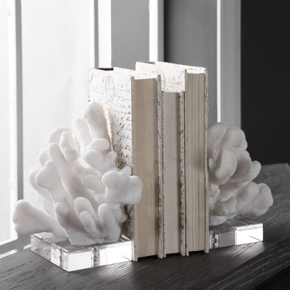 Charbel Bookends by Uttermost in white. Made from resin, k9cystal in a coastal style.