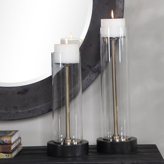 Charvi Candleholders by Uttermost in aged brass, bronze. Made from steel, glass, polyester in a modern style.