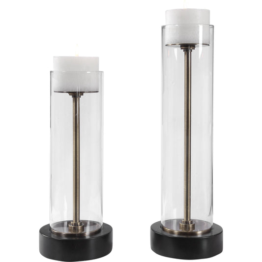 Charvi Candleholders by Uttermost in aged brass, bronze. Made from steel, glass, polyester in a modern style.