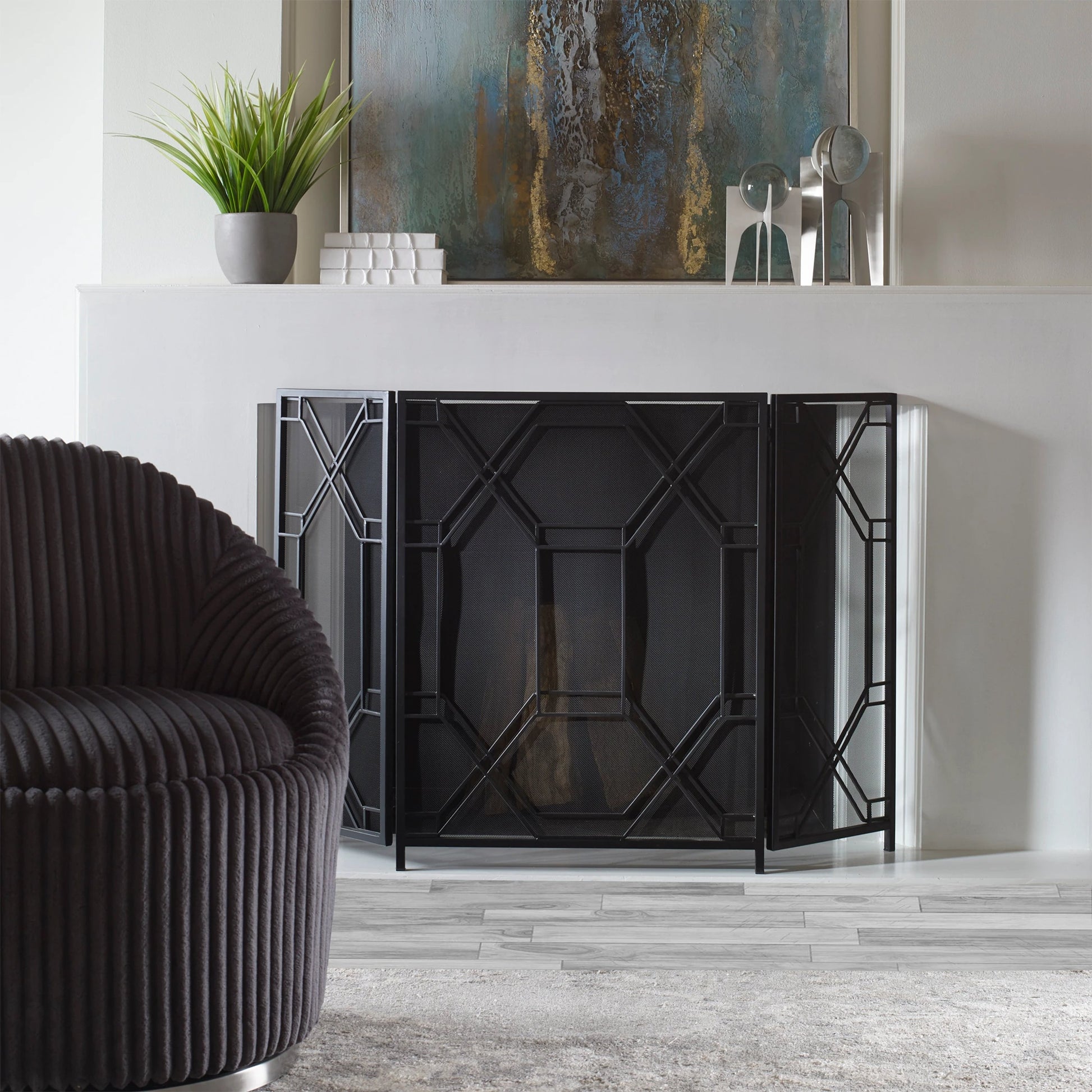 Rosen Fireplace Screen by Uttermost in gold. Made from metal in a traditional style.
