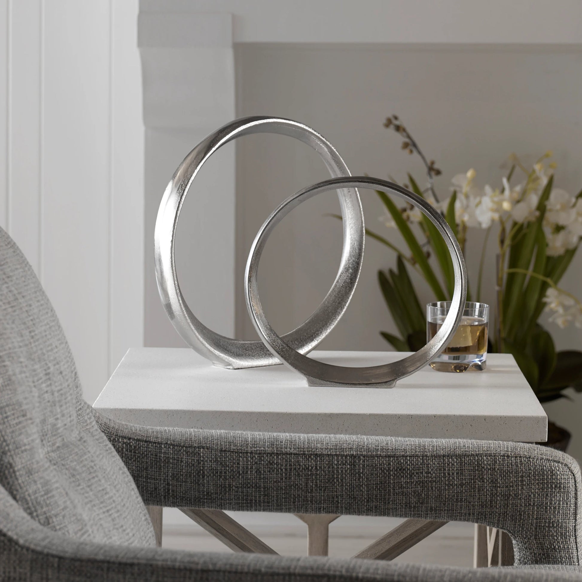 Orbits Ring Sculptures by Uttermost. Made from aluminum in a modern style.