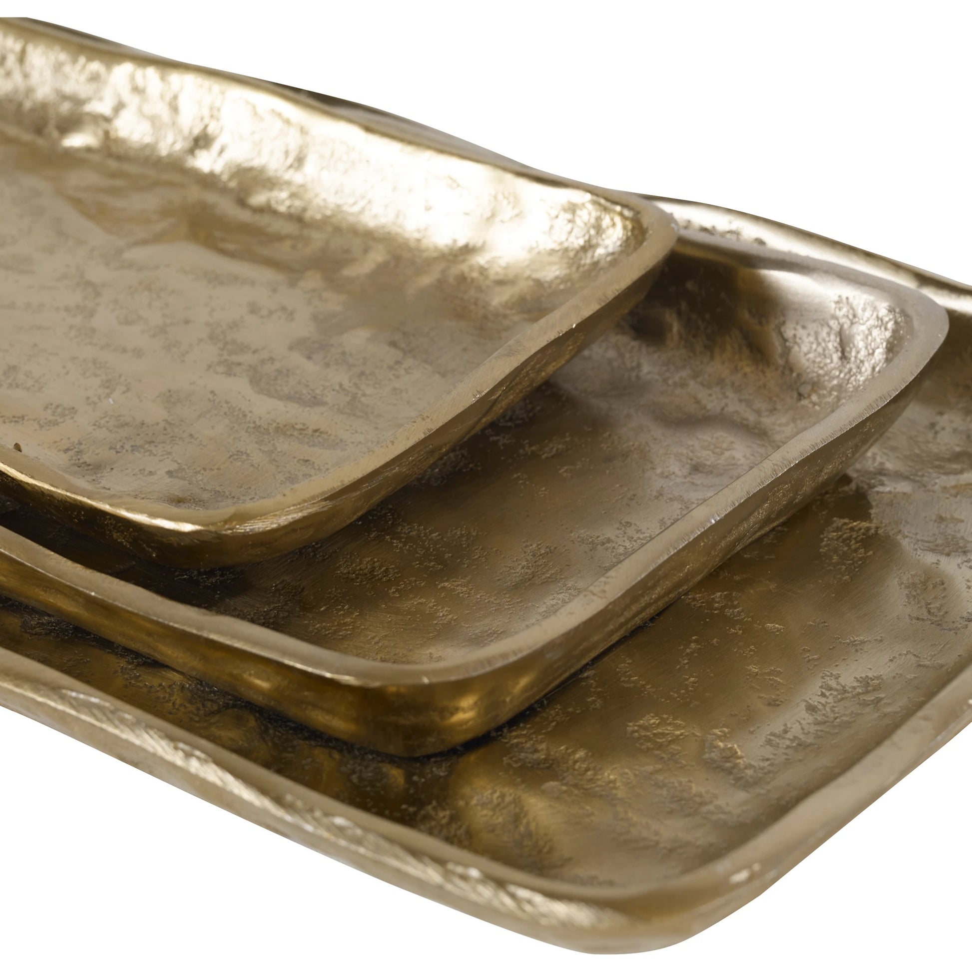 Artisan Trays by Uttermost in gold. Made from aluminum in a transitional style.
