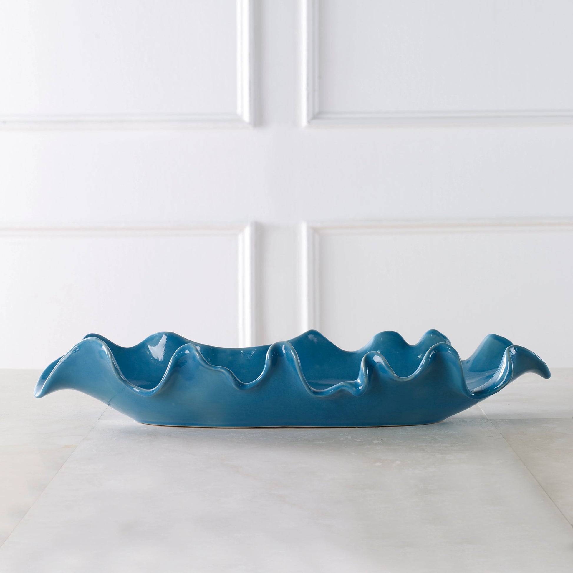 Ruffled Feathers Bowl by Uttermost. Made from earthenware in a modern style.
