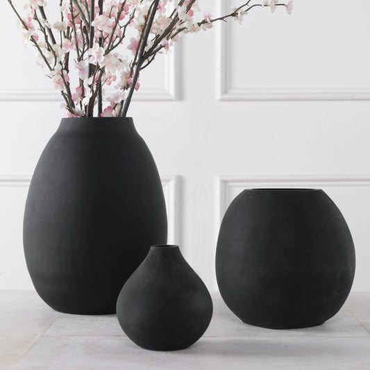 Hearth Vases by Uttermost in matte black. Made from glass in a modern style.