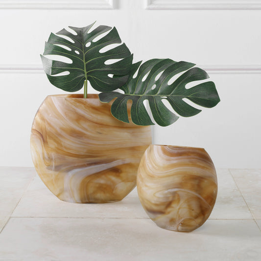 Fusion Vases by Uttermost in caramel, ivory. Made from glass in a modern style.