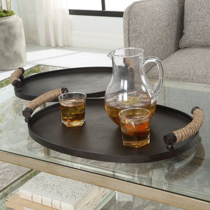 Viggo Trays by Uttermost in oxidized bronze. Made from iron, rope in a modern style.
