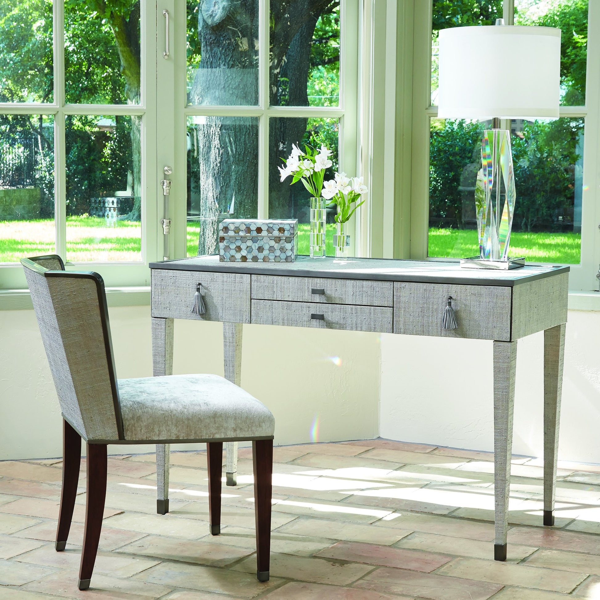 Argento Chair by Global Views in pewter. Made from acacia, beech, raffia, steel, velvet in a transitional style.