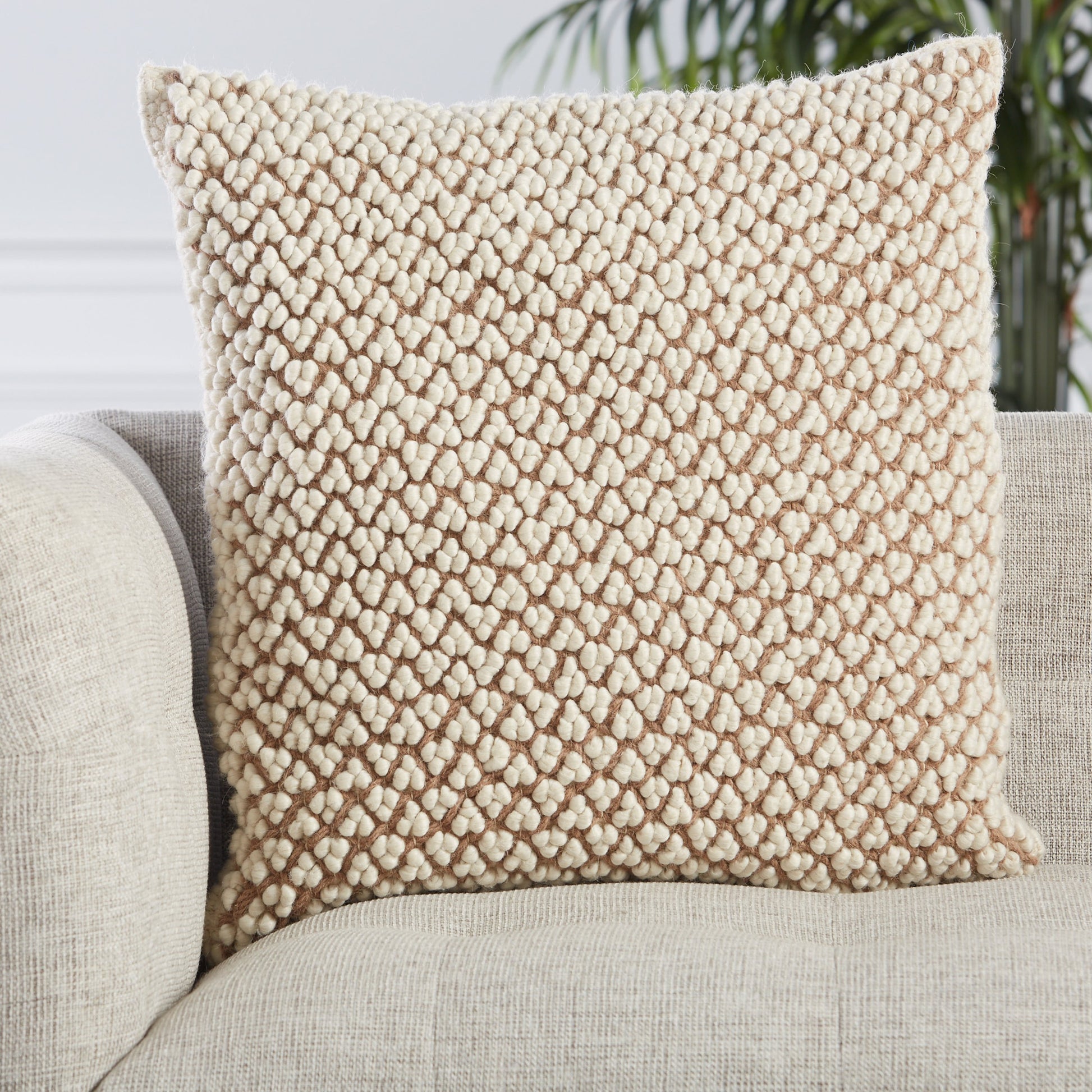 Angora AGO02 Pillow by Jaipur Living. Made from 55% wool 35% polyester 10% linen in a rustic style.