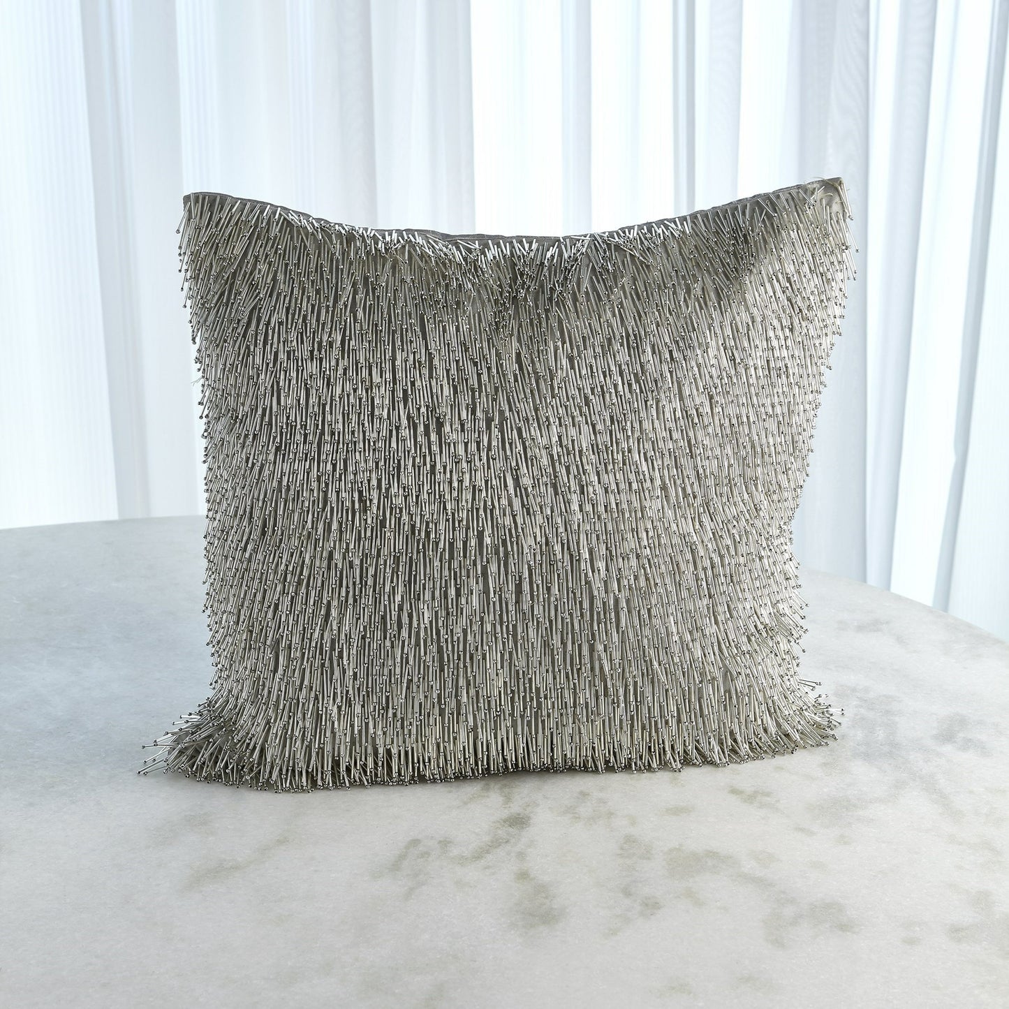 001 SR-890764 | Primary Silo | Shimmy Fringe Pillow by Global Views in silver and silver. Made from polyester with cotton lining fitted with glass beads in a transitional style.