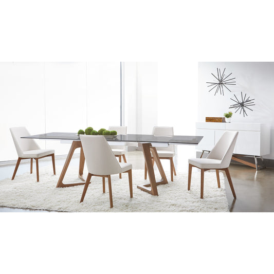 Axel Dining Table by Essentials For Living in walnut, stainless steel, smoke gray glass. Made from walnut veneer, glass in a modern style.