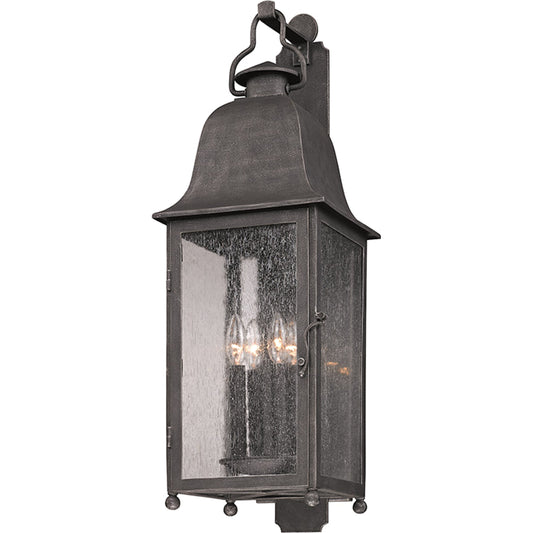 Larchmont Wall Lantern by Troy in aged pewter. Made from hand-worked iron in a traditional style.