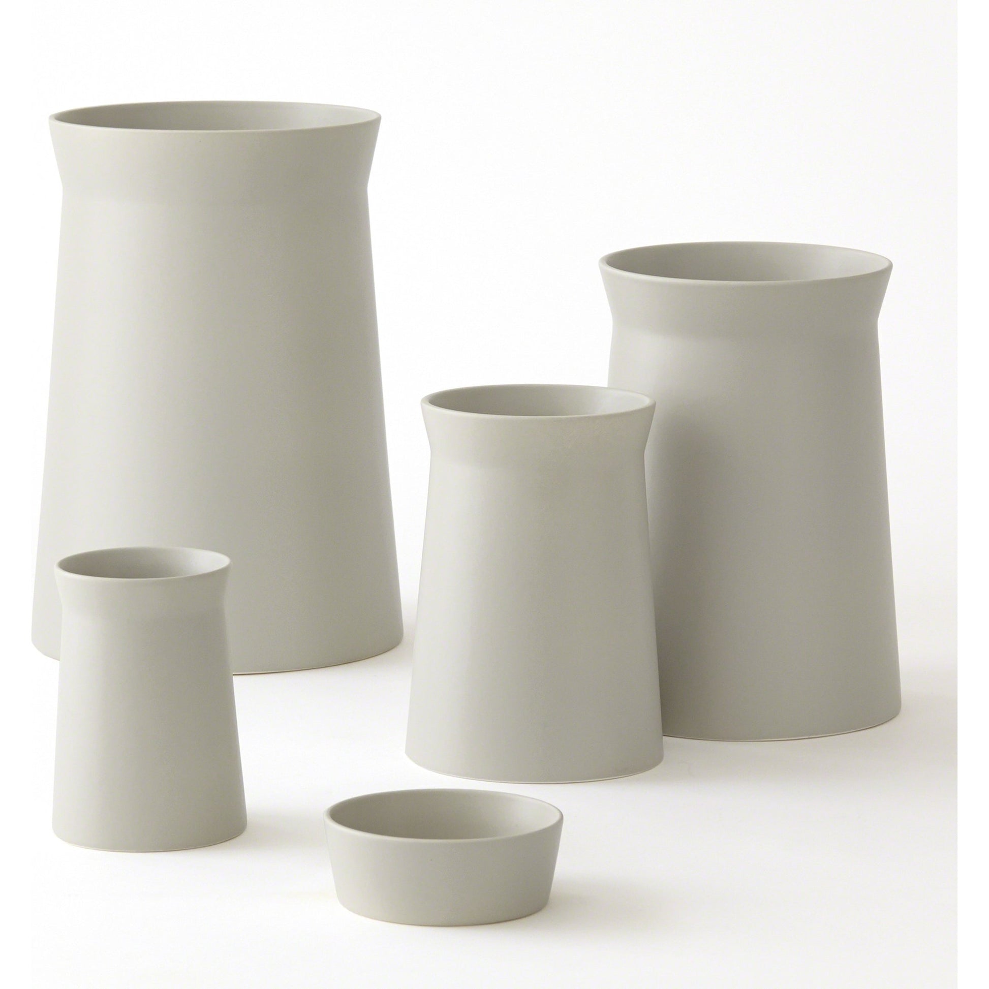 Soft Curve Vase by Global Views in white. Made from ceramic in a modern style.