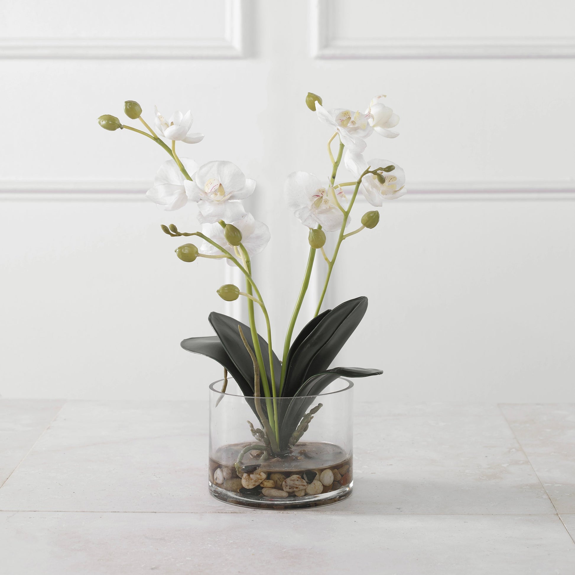Glory Orchid by Uttermost in white. Made from polyester, plastic, iron, stone, glass in a modern style.