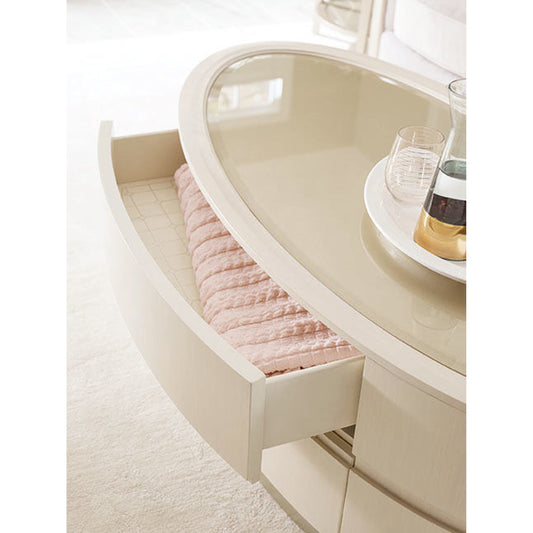 Oval Cocktail Table with Drawers by Caracole in taupe and washed alabaster, blush taupe. Made from birch, enginerred maple in a modern style.