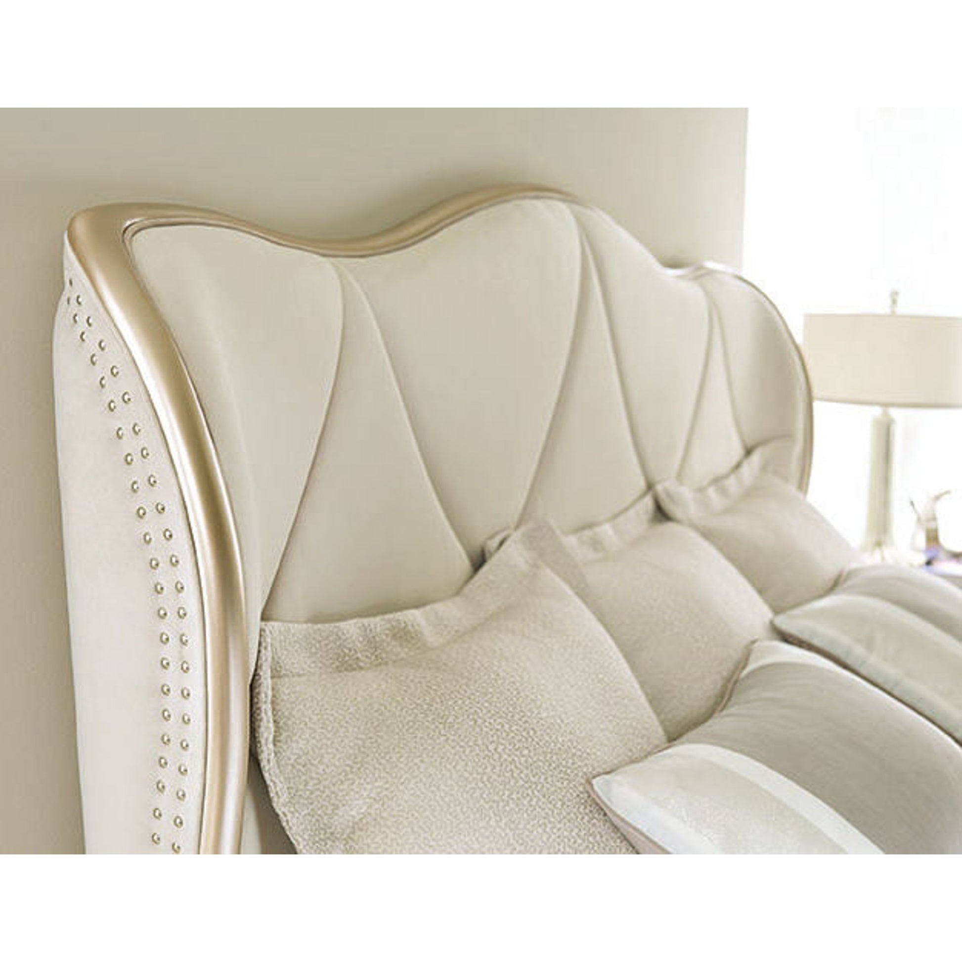Diamond Quilted Upholstered Sleigh Bed by Caracole in taupe and blush taupe. Made from birch in a transitional style.