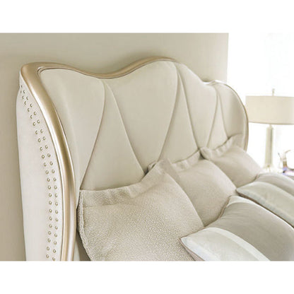 Diamond Quilted Upholstered Sleigh Bed by Caracole in taupe and blush taupe. Made from birch in a transitional style.