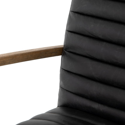 Bryson Channeled Desk Chair by Four Hands in durango smoke and toasted nettlewood, stainless steel. Made from top grain leather, stainless steel, solid nettlewood in a modern style.