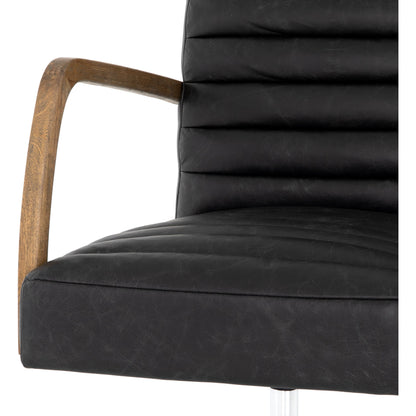 Bryson Channeled Desk Chair by Four Hands in durango smoke and toasted nettlewood, stainless steel. Made from top grain leather, stainless steel, solid nettlewood in a modern style.