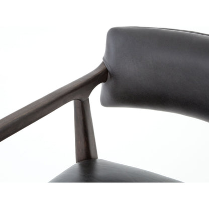 Tyler Counter Stool by Four Hands in chaps ebony, burnt oak. Made from top grain leather, solid nettlewood, 100% polyester in a modern style.