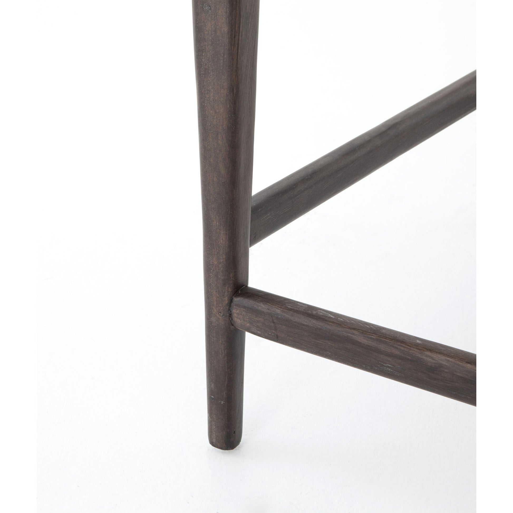 Tyler Counter Stool by Four Hands in chaps ebony, burnt oak. Made from top grain leather, solid nettlewood, 100% polyester in a modern style.