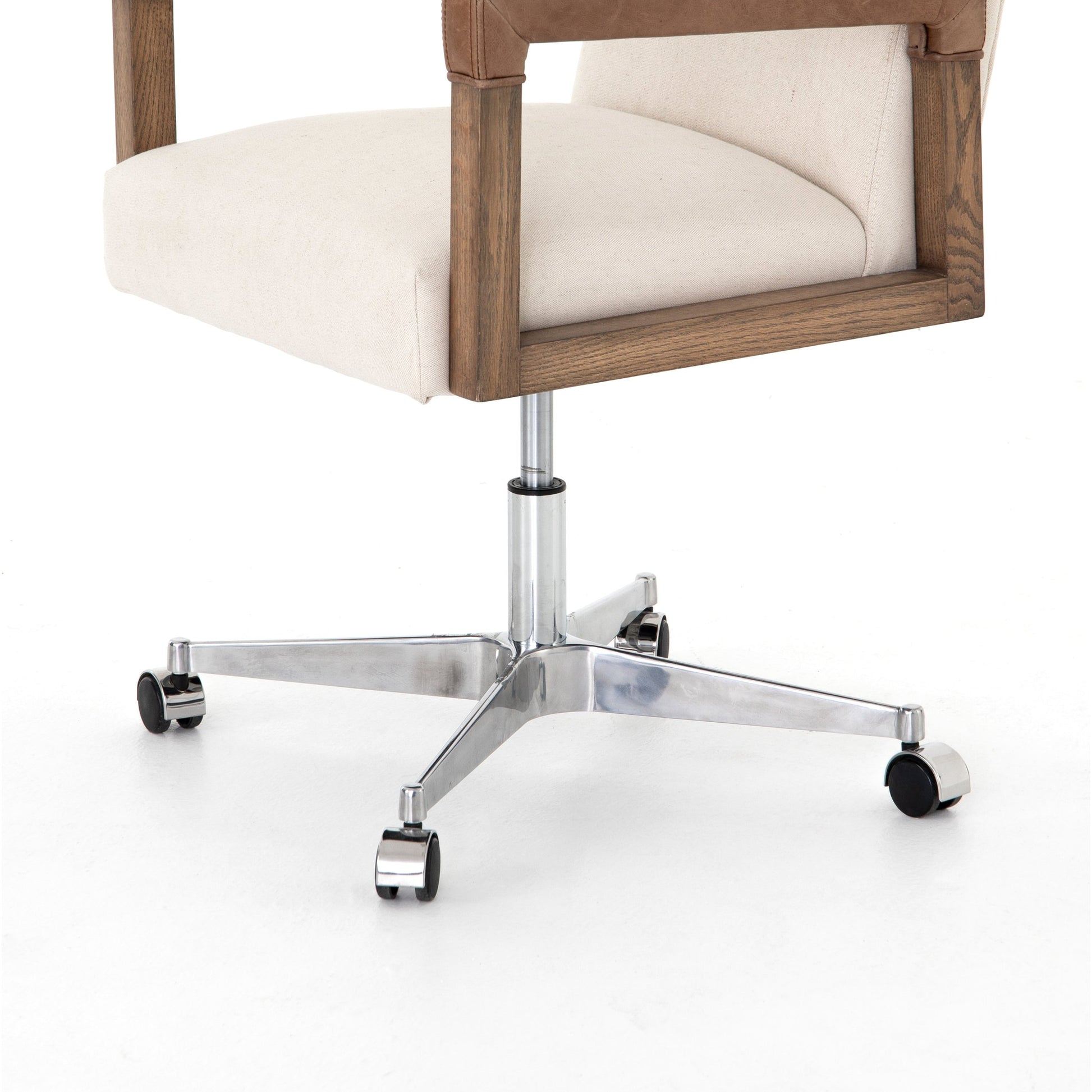 Reuben Desk Chair by Four Hands in lamont nettlewood, chaps saddle, stainless steel, harbor natural and harbor natural. Made from 60% cotton, 40% flax, linen, solid nettlewood, stainless steel in a modern style.