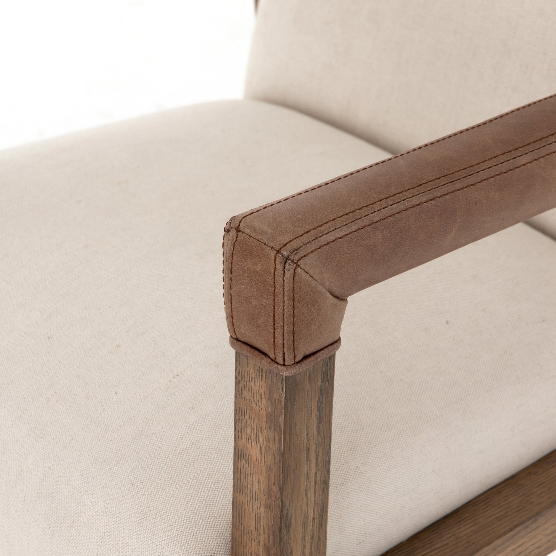 Reuben Desk Chair by Four Hands in lamont nettlewood, chaps saddle, stainless steel, harbor natural and harbor natural. Made from 60% cotton, 40% flax, linen, solid nettlewood, stainless steel in a modern style.