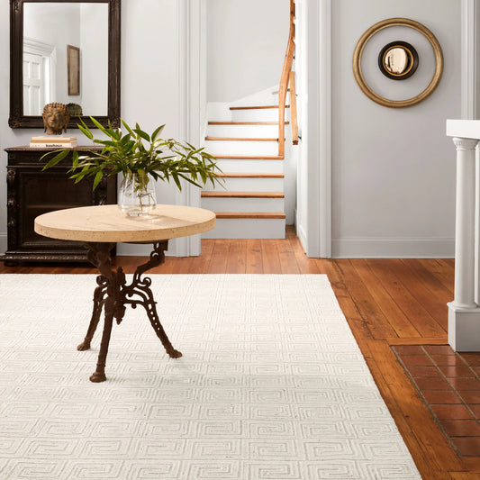 Capital CAP03 Rug by Jaipur Living in ivory. Made from 60% viscose, 40% wool in a unique style.