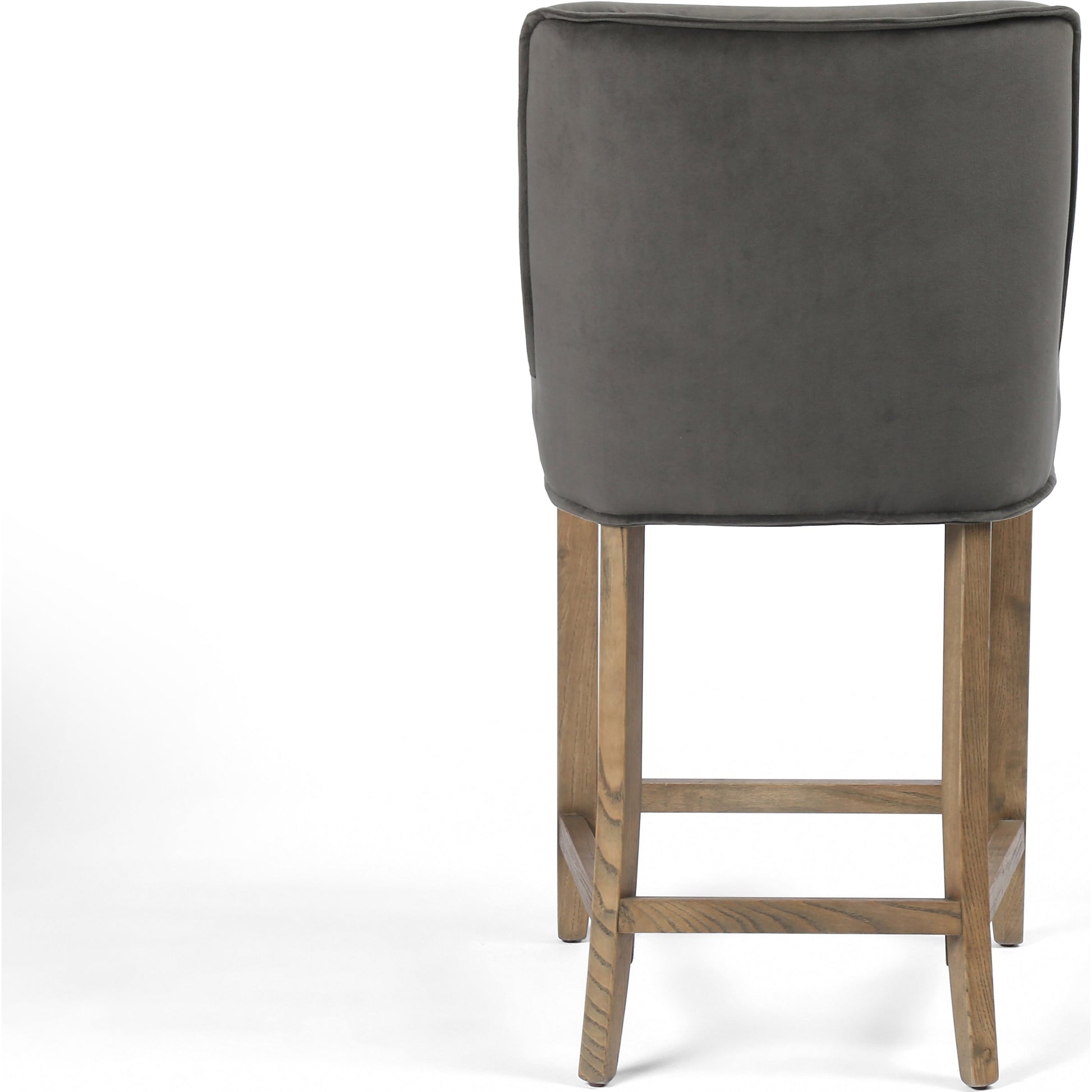 Aria Counter Stool by Four Hands in sienna chestnut. Made from top grain leather, solid nettlewood, 100% polyester in a modern style.