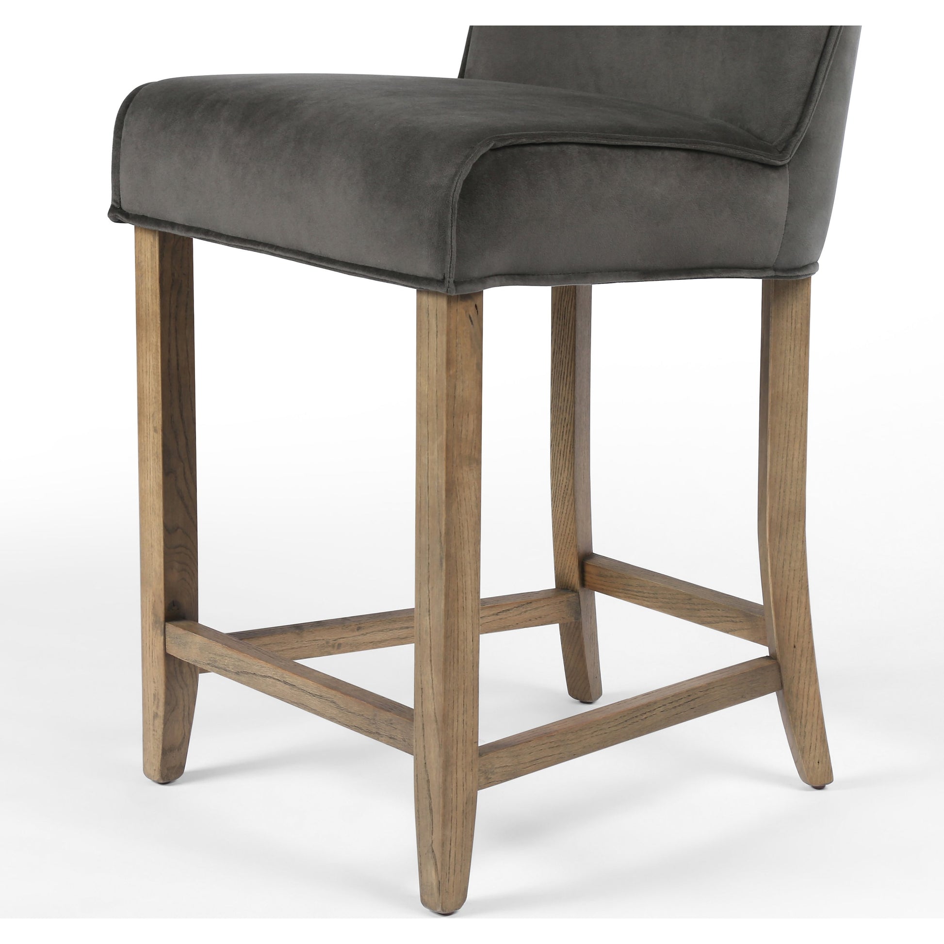 Aria Counter Stool by Four Hands in sienna chestnut. Made from top grain leather, solid nettlewood, 100% polyester in a modern style.