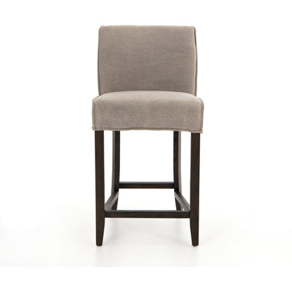Aria Counter Stool by Four Hands in sienna chestnut. Made from top grain leather, solid nettlewood, 100% polyester in a modern style.