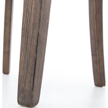 Aria Dining Chair by Four Hands in sienna chestnut, warm nettlewood and sienna chestnut. Made from top grain leather, solid nettlewood, 100% polyester in a modern style.