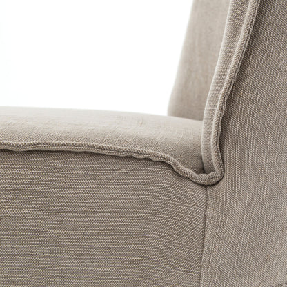 Aria Dining Chair by Four Hands in sienna chestnut, warm nettlewood and sienna chestnut. Made from top grain leather, solid nettlewood, 100% polyester in a modern style.