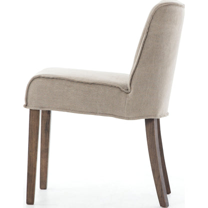Aria Dining Chair by Four Hands in sienna chestnut, warm nettlewood and sienna chestnut. Made from top grain leather, solid nettlewood, 100% polyester in a modern style.