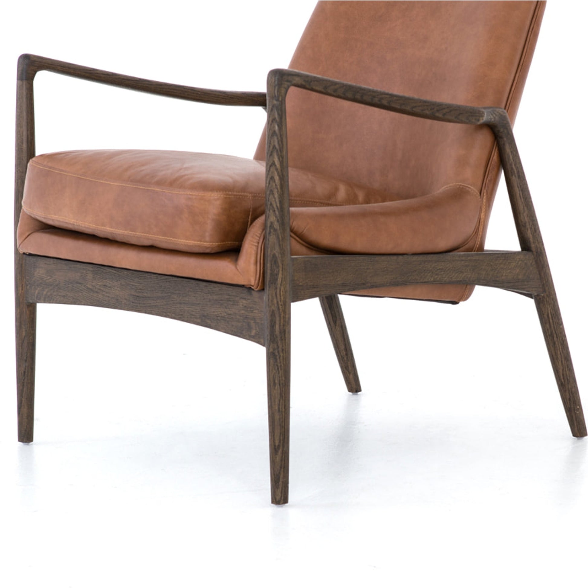 Braden Chair by Four Hands. Made from top grain leather, solid oak, 100% polyester in a modern style.